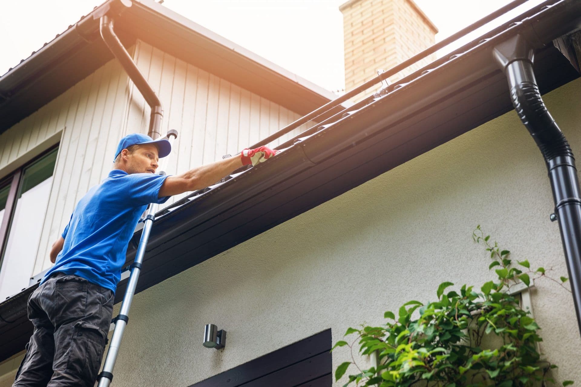 bigstock-Man-On-Ladder-Cleaning-House-G-244783075-2048x1365